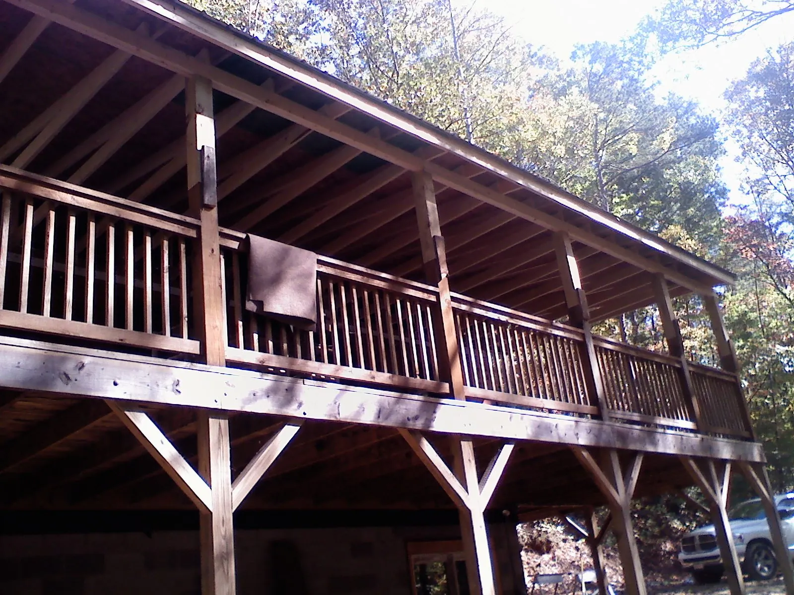 Timber framing under a new elevated porch and deck — Roof Leak Repair in Deanville by Roofing Brothers